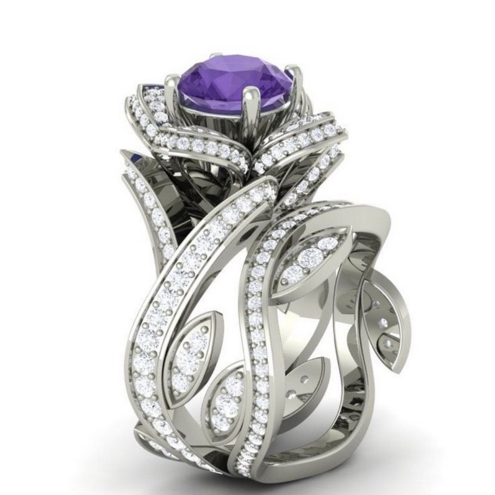 Rose 🌹 ring with a purple stone!